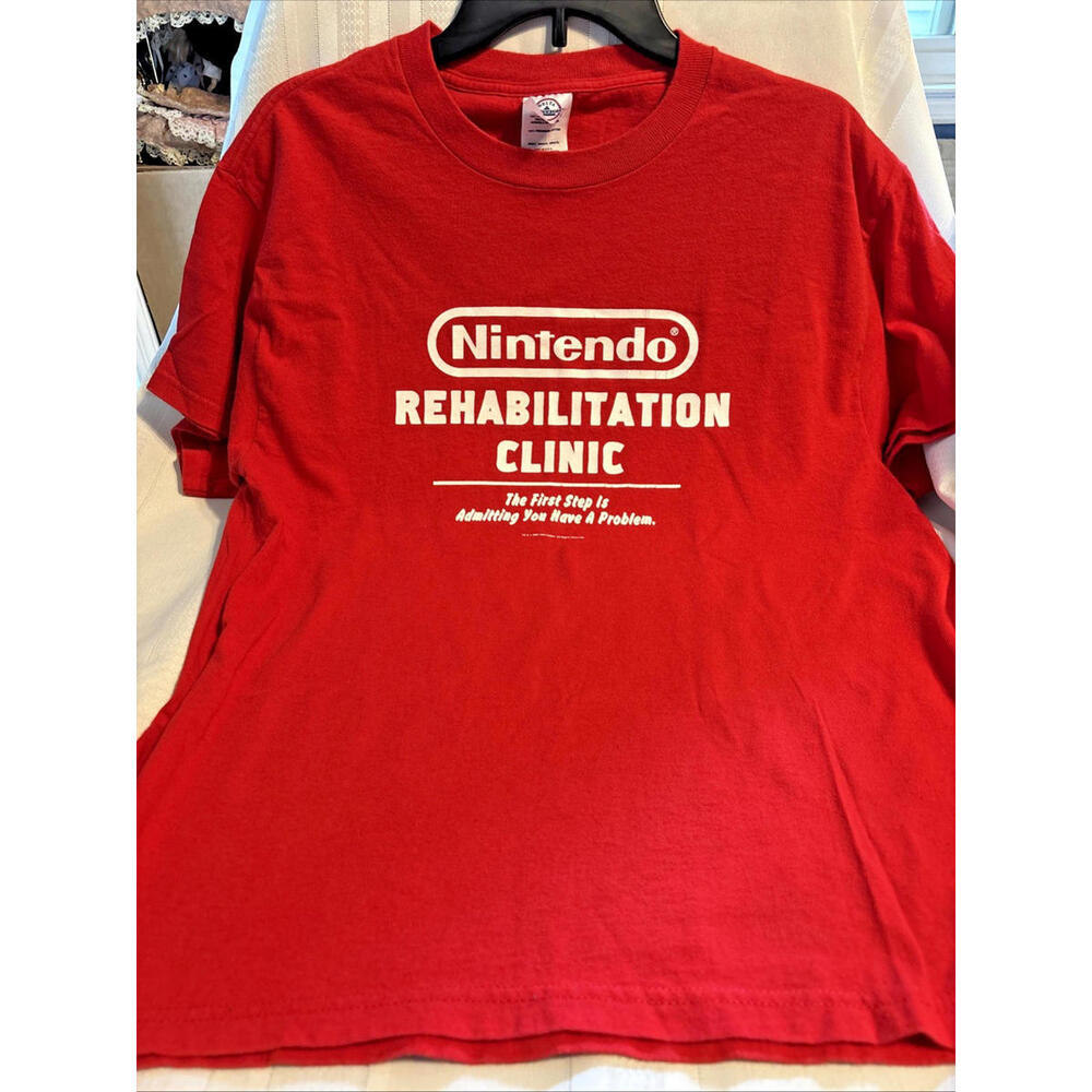 Vintage 2004 Nintendo Rehabilitation Clinic Red Short Sleeve T-Shirt Size Medium